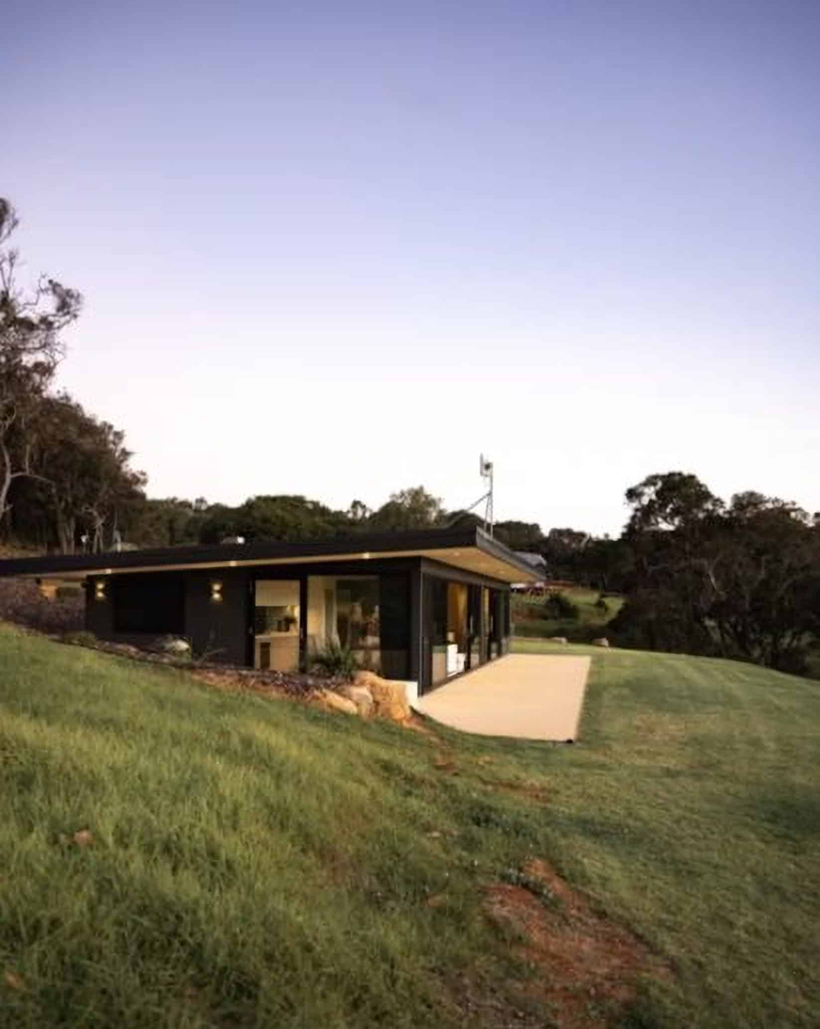 Modern accommodation at The Jolly Swagman with scenic rural surroundings in Australia.